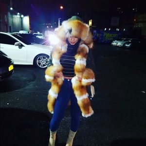 Excellent condition ( real fur) fits like a Small